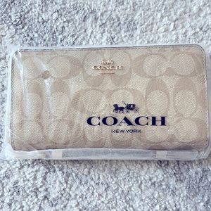 Coach Long Zip Wallet. Still in packaging- brand new.